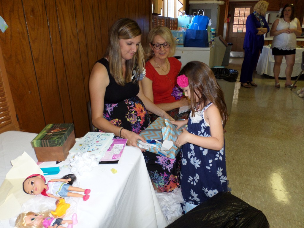 Kalea being a big helper while at a baby shower hosted in SC during our visit last month. Thanks Bethel Baptist!